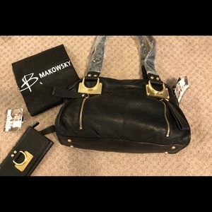 B. Markowsky black handbag. Never been used.
